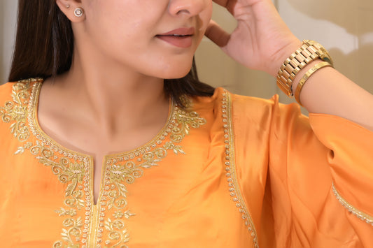 Elegant Orange Silk Kurta Set with Embroidered Neckline – Women’s Festive Ethnic Wear